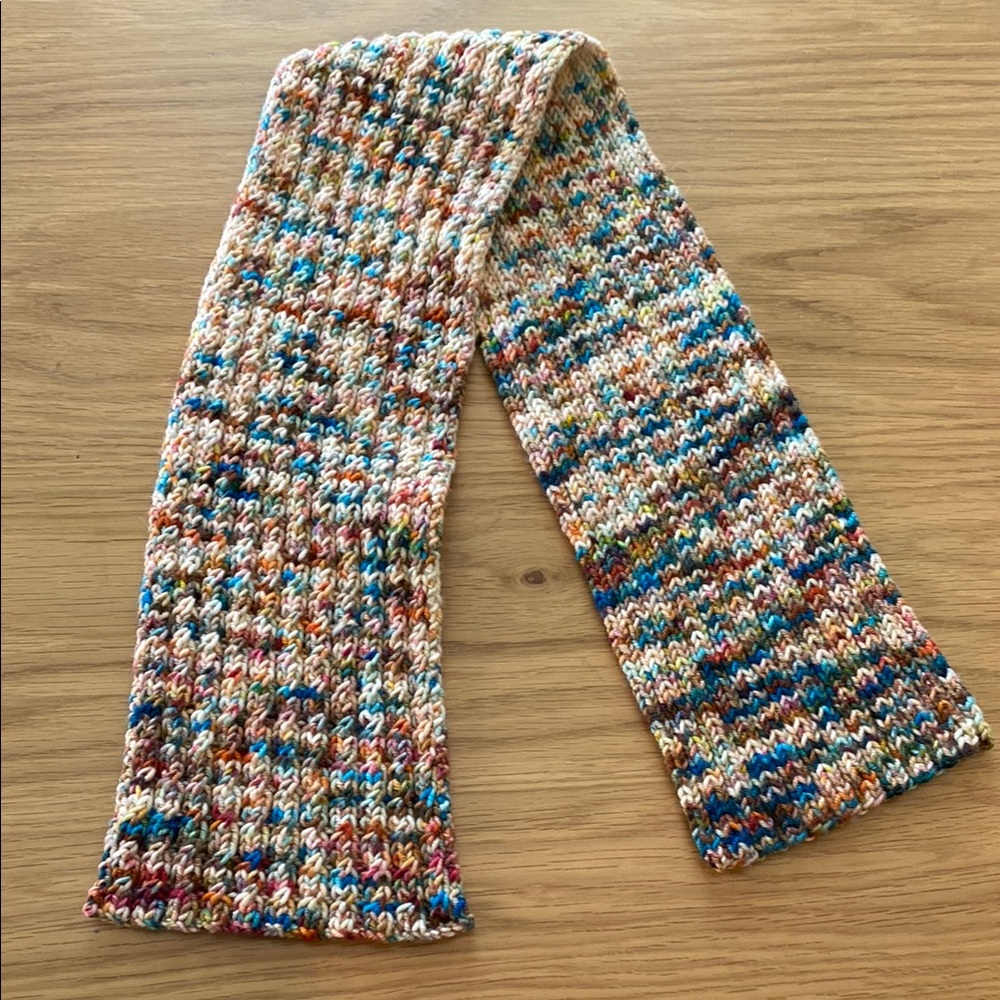 Hand knitted children’s scarf. 5” X 35”.